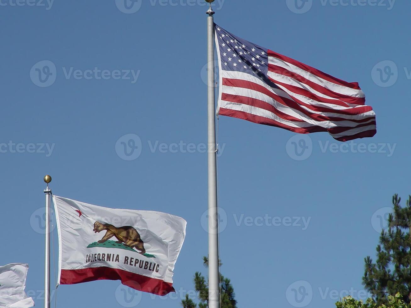 United States And California State Flag Blue sky photo