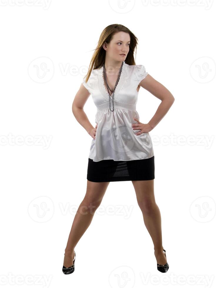Full length woman in black skirt and white blouse photo