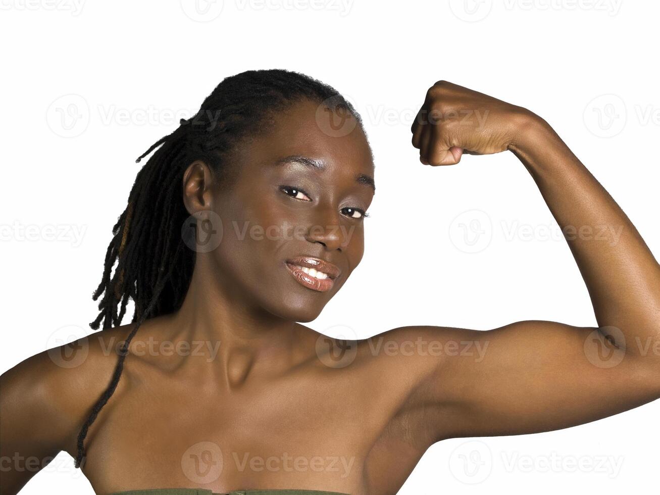 Young black woman showing her bicep muscle photo