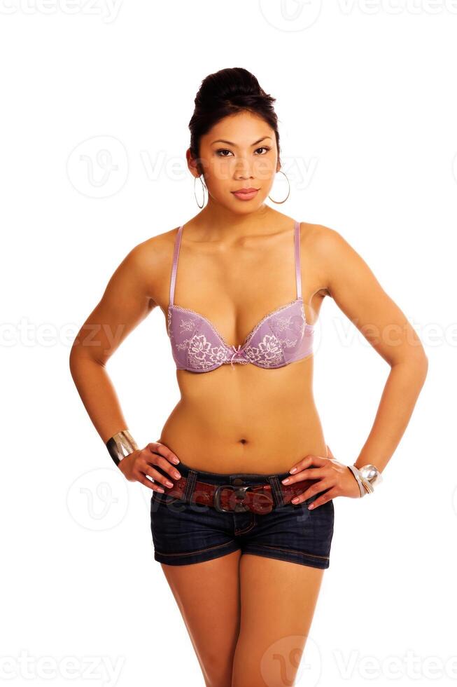 Beautiful Pacific Islander Woman Standing In shorts And Bra photo
