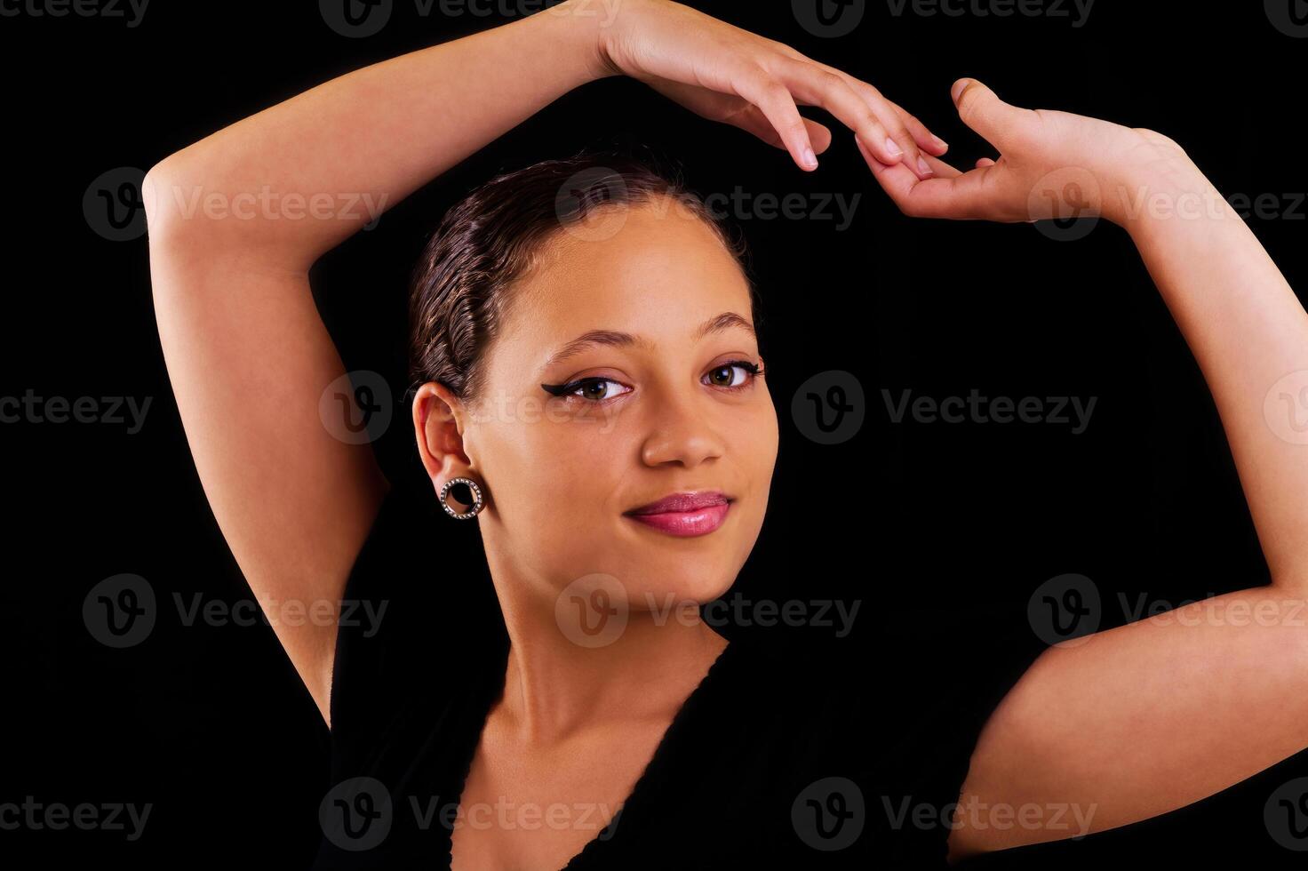 Attractive African American Woman On Dark Background photo