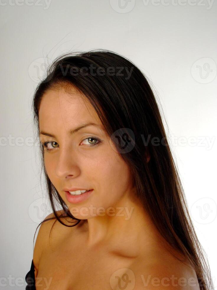 Bare Shoulder Portrait Of Young Caucasian Woman Dark Hair photo