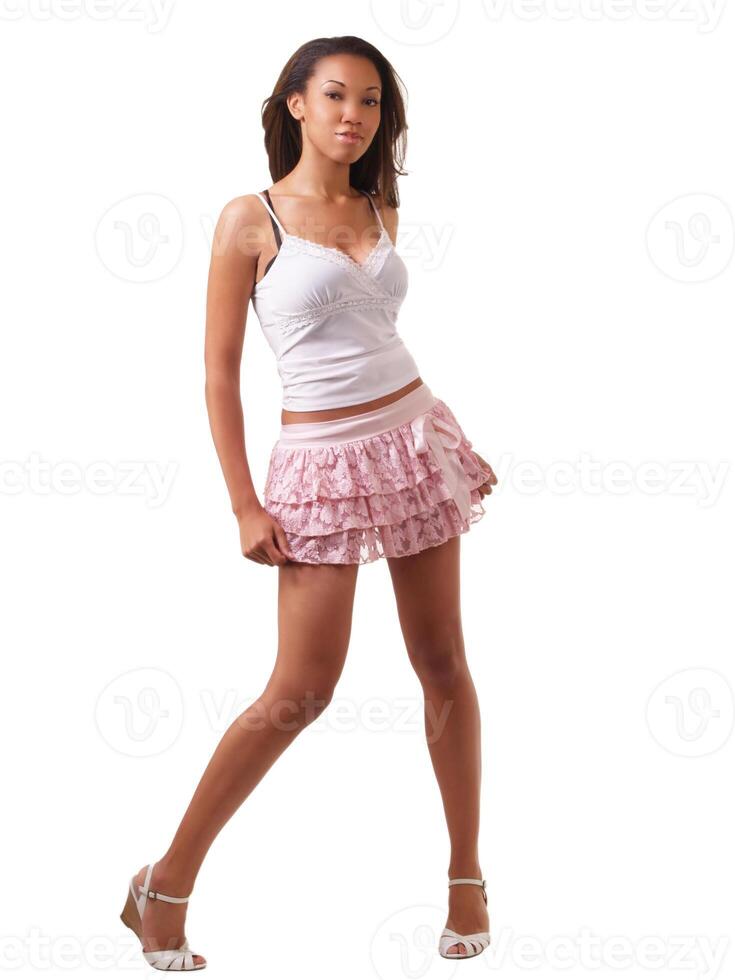 Young woman in short skirt and top photo