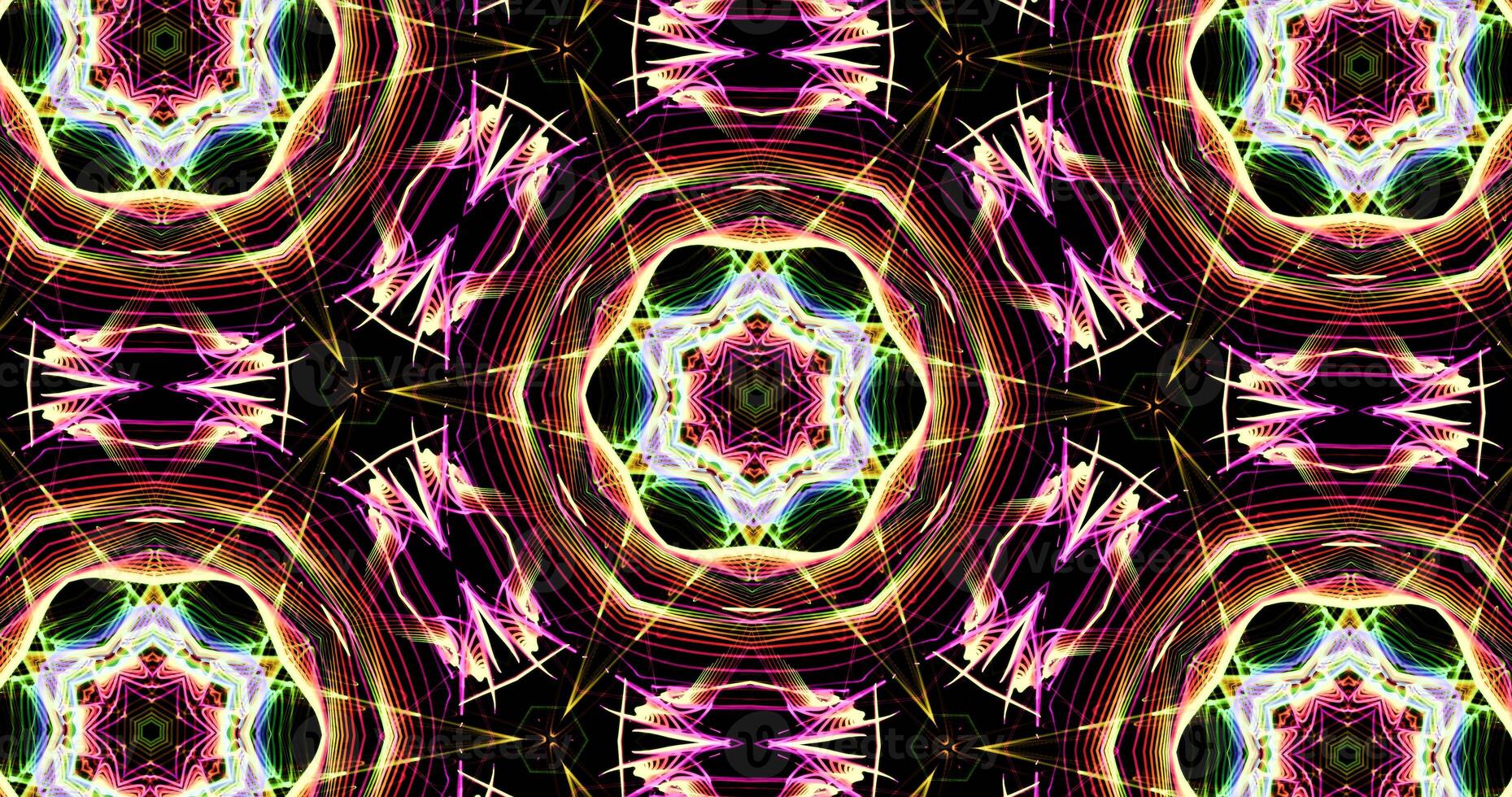 calidoscópico modelo en oscuro antecedentes en vibrante colores foto