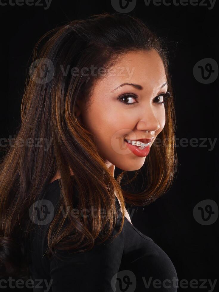 Smiling African American Woman Portrait With Braces Upper Teeth photo