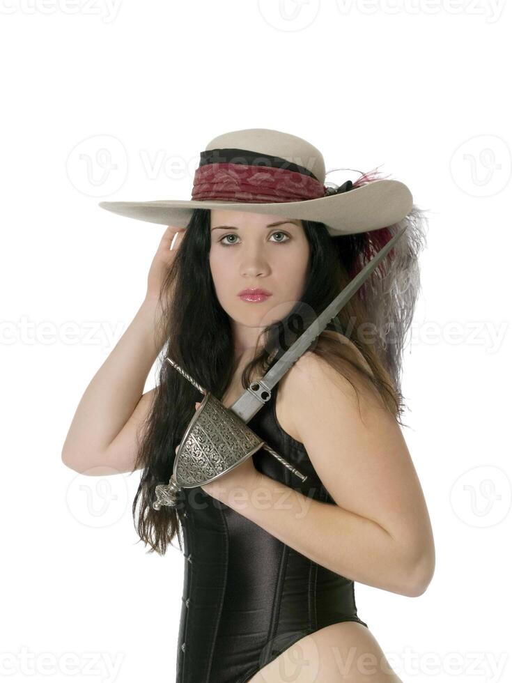 Woman in feathered hat with dagger and corset photo