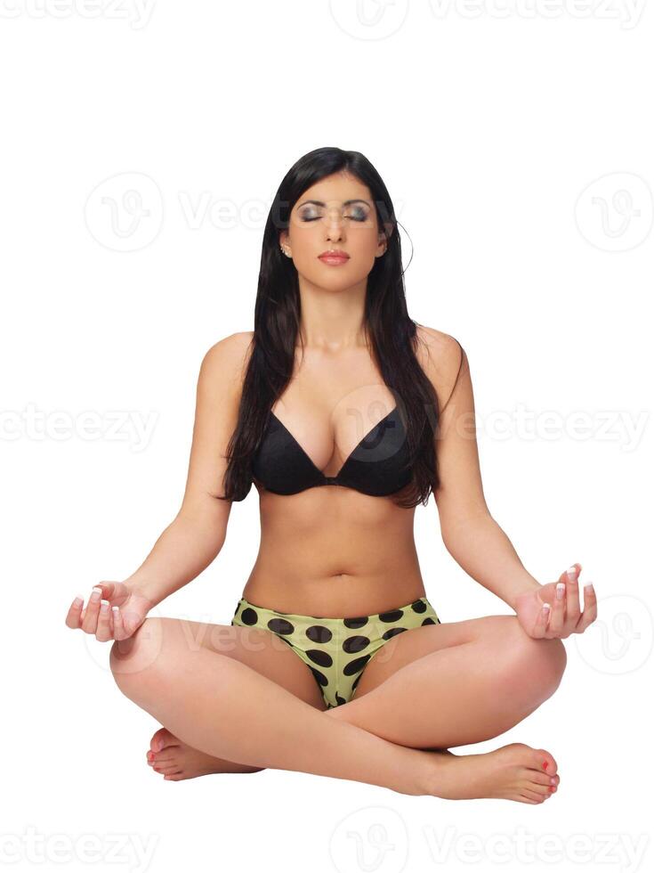Young middle eastern woman sitting lotus photo