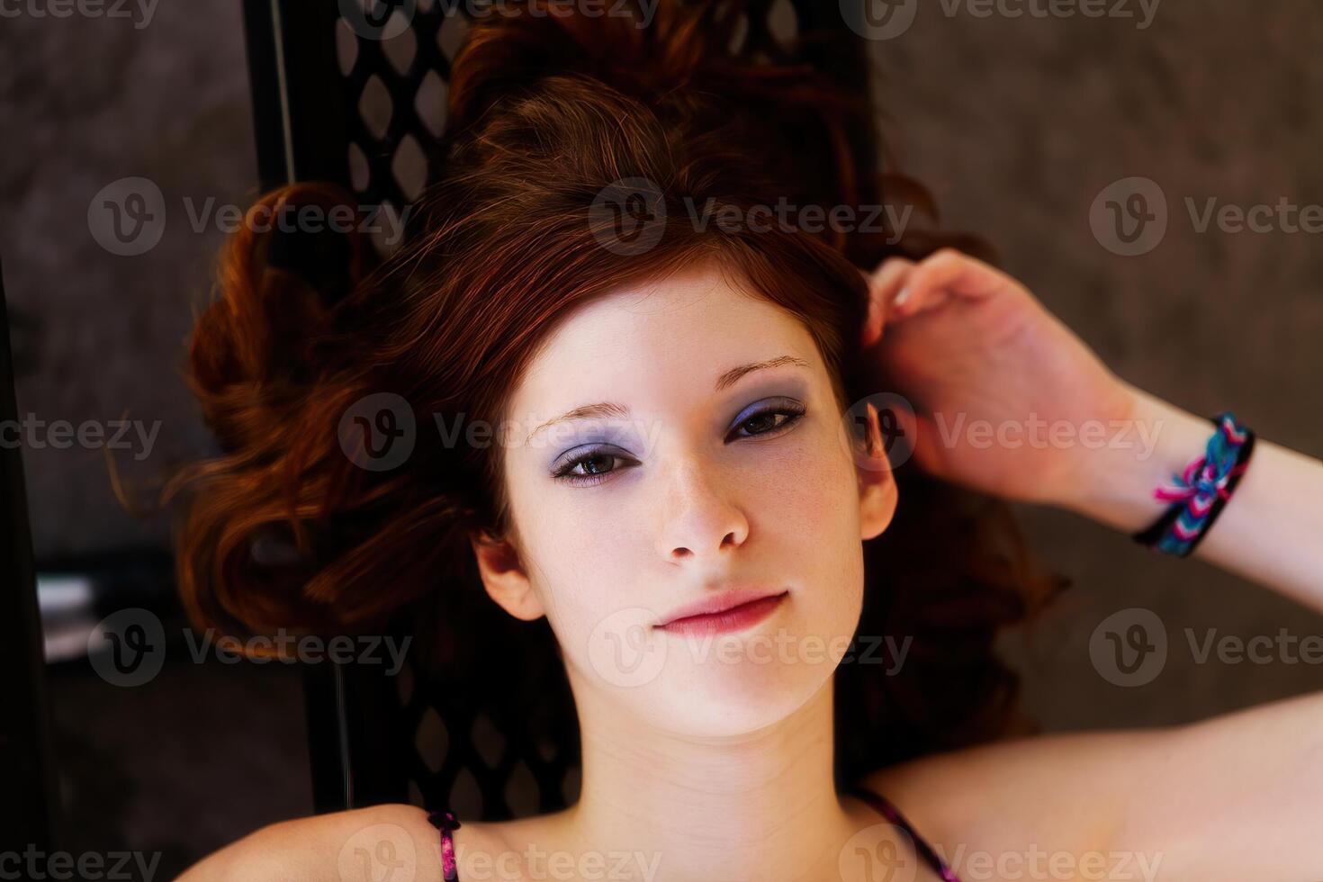Young Pretty Teen Caucasian Girl Outdoor Portrait Reclining photo