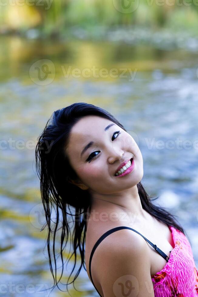 Outdoor Portrait Japanese American Woman At River photo