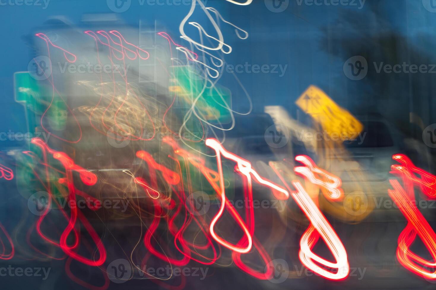 Abstract Design Created By Car Lights And Traffic Signs photo