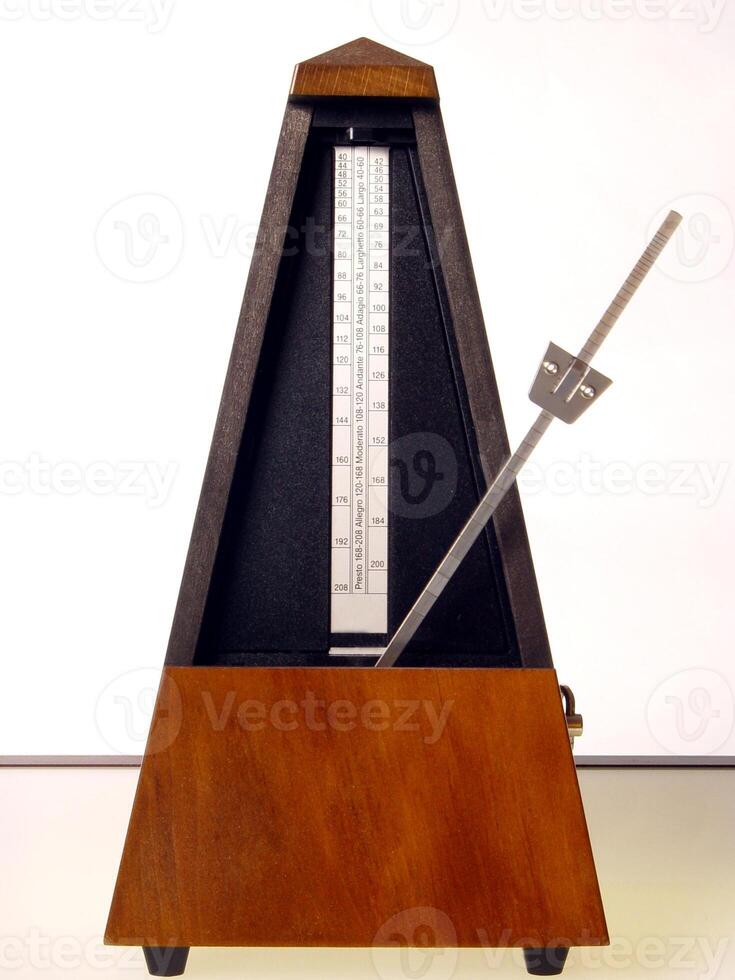 Wooden Mechanical Metronome With Arm To One Side photo