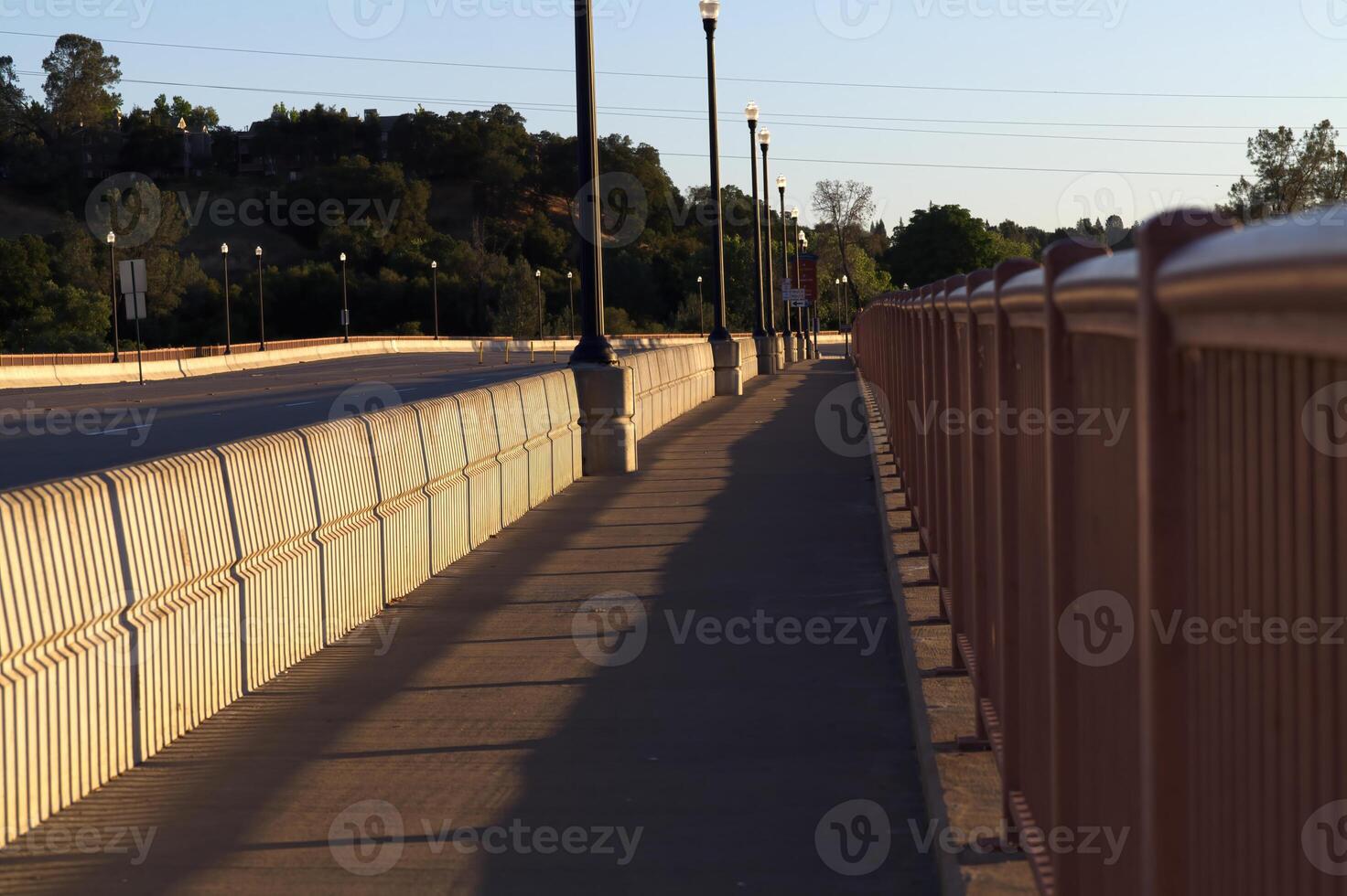 Empty Bridge Road And Walkway Early Morning Blue Sky photo