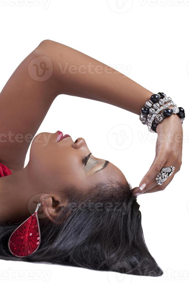 Profile young black woman arm framing face photo