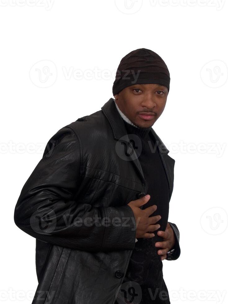 Young African American Man In Jacket And Hat Indoors photo