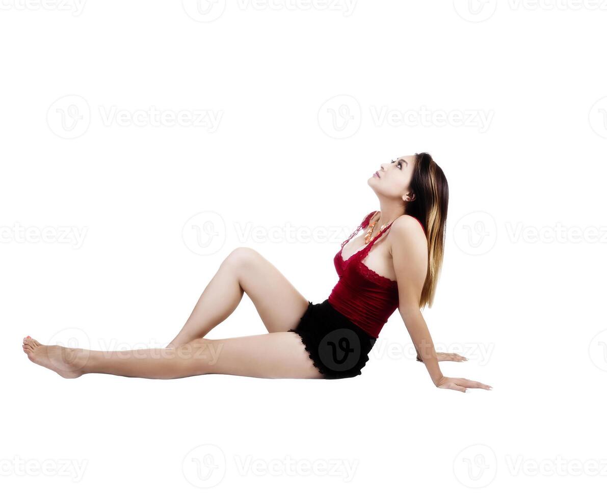 Attractive Asian American Woman Sitting Black Shorts Red Top photo