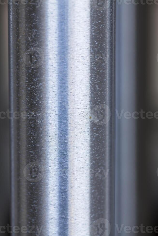 Aluminum Metal Tube Chime Closeup Indistinct Background photo