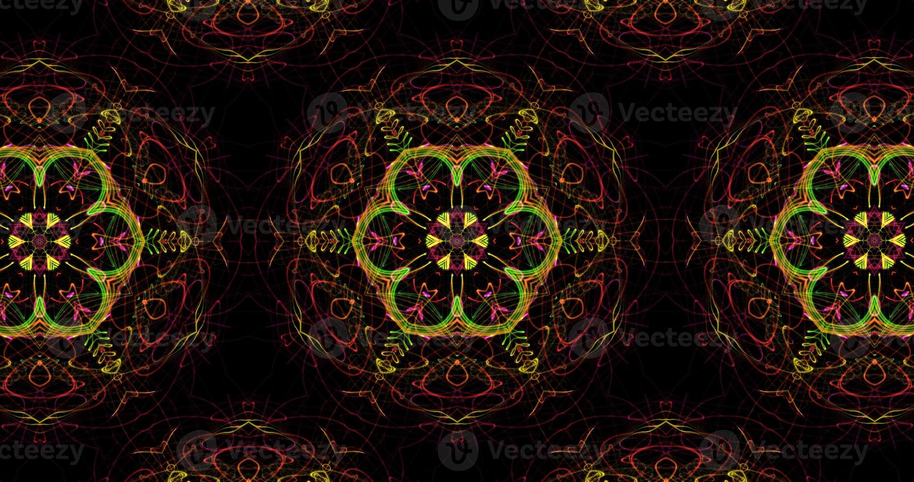 Kaleidoscopic Pattern On Dark Background In Vibrant Colors photo