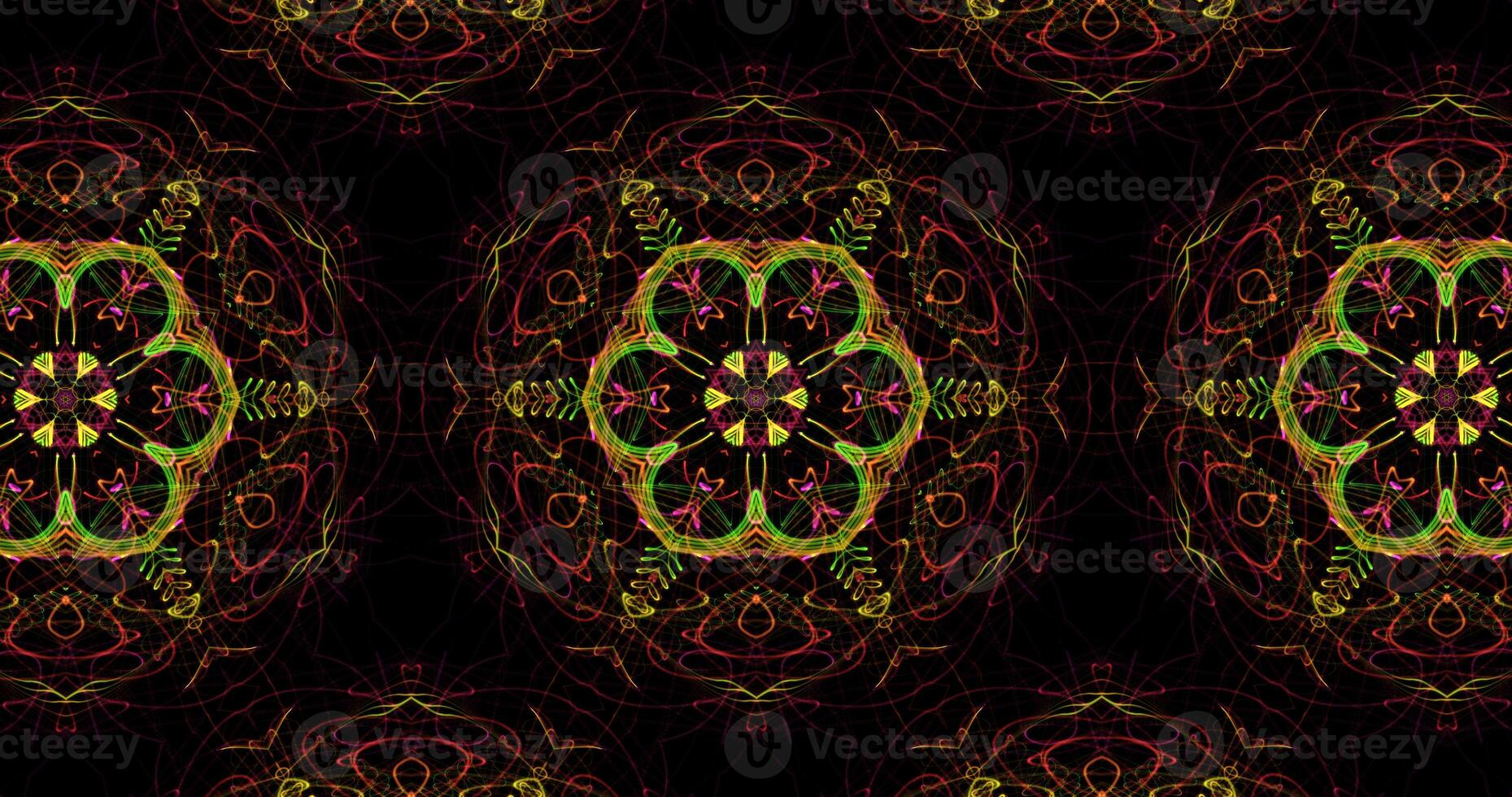 Kaleidoscopic Pattern On Dark Background In Vibrant Colors photo