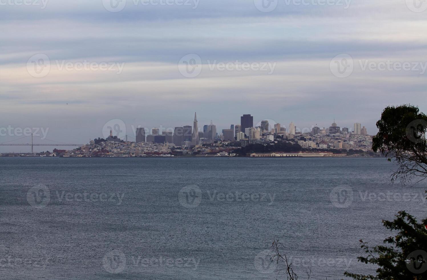 San Francisco Cityscape With Overcast Sky And Bay photo