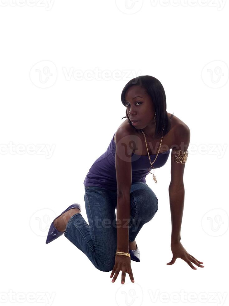 Young Black Woman Kneeling photo