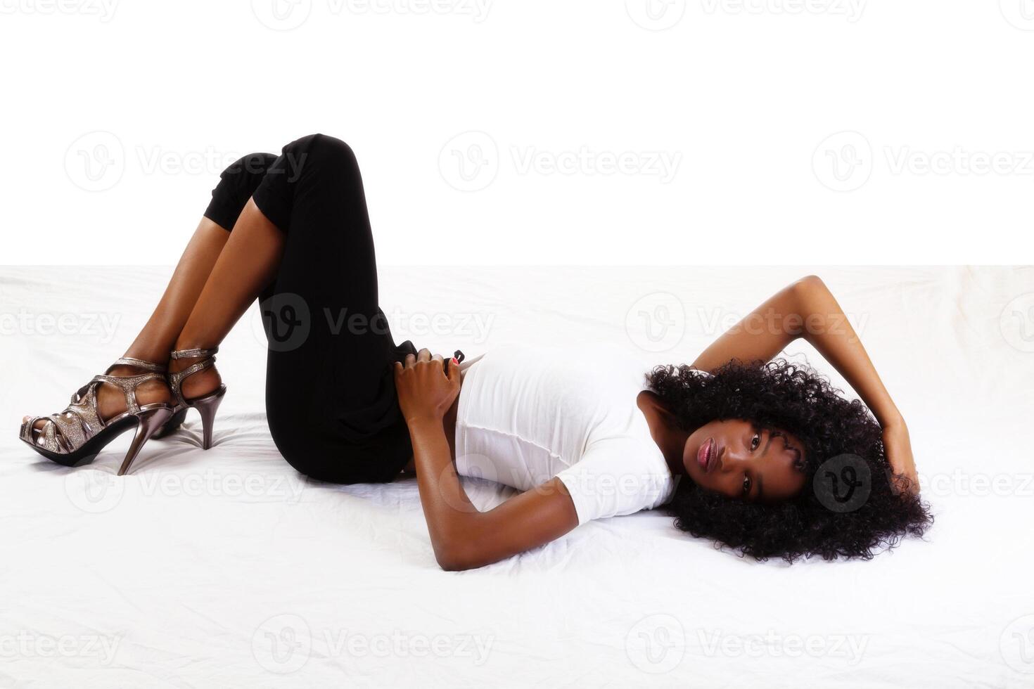 Skinny Attractive Teen African American Girl Reclining photo
