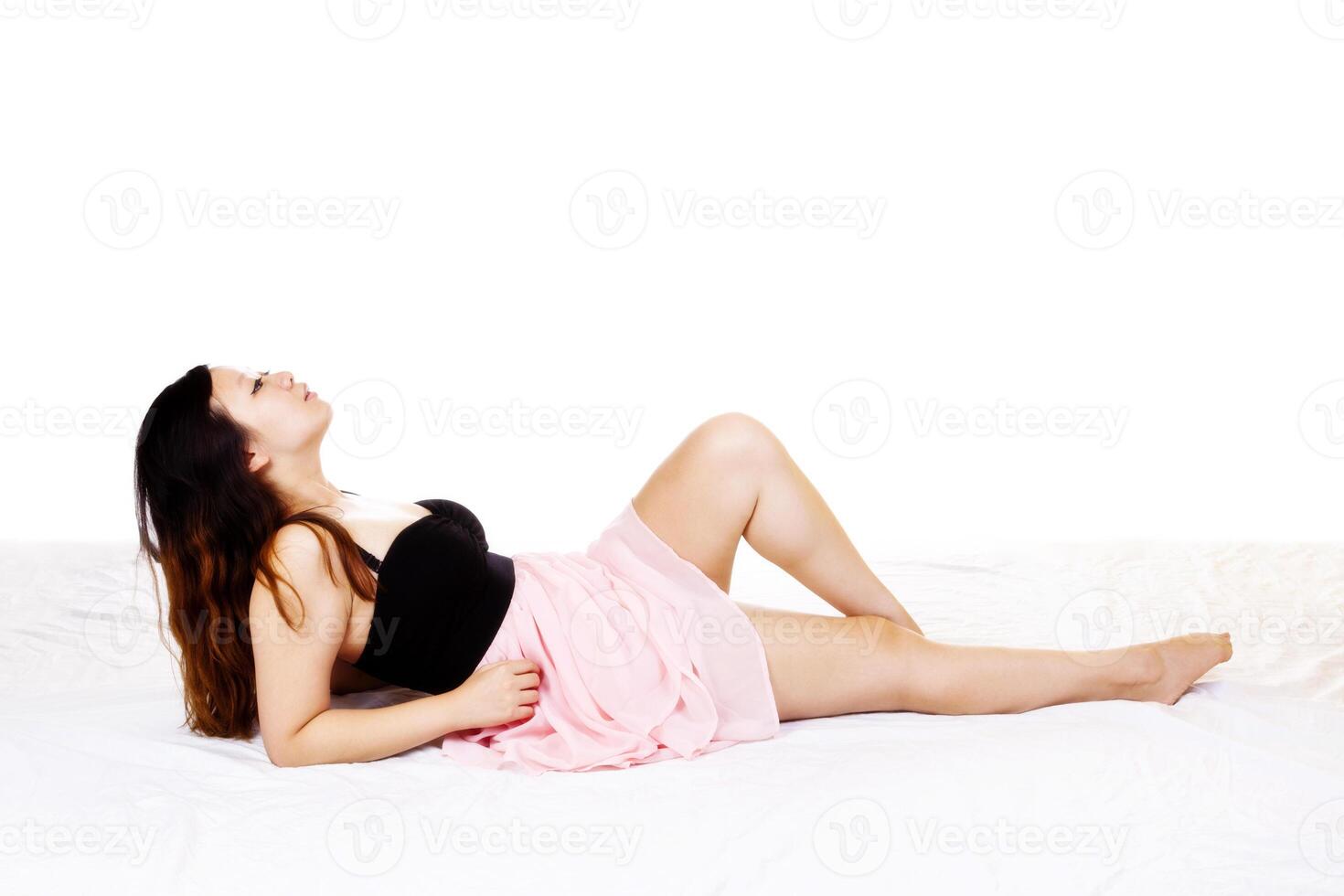 Chinese Woman Pink And Black Dress Reclining photo