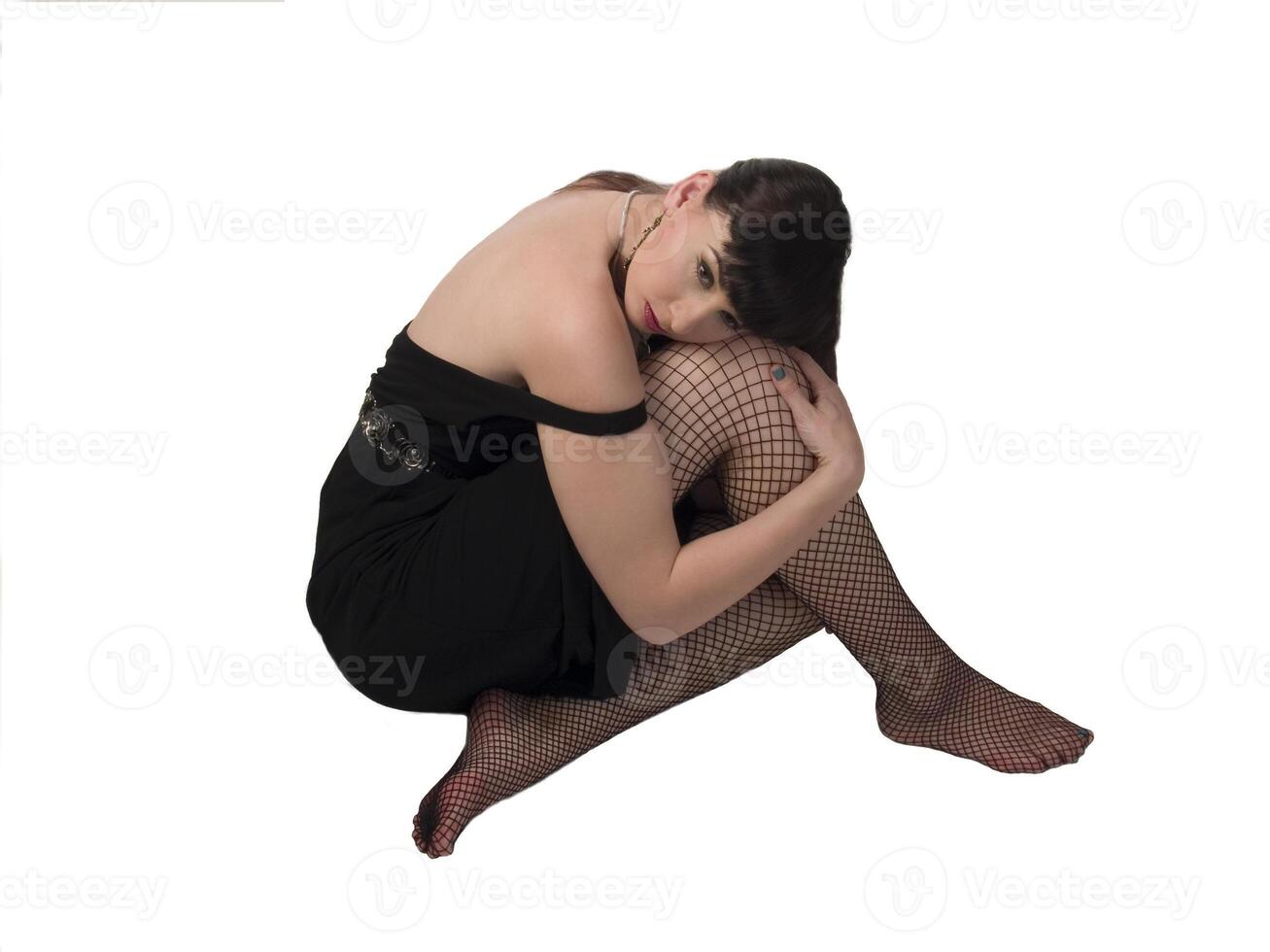 Woman in Black Dress and Fishnet Stockings photo