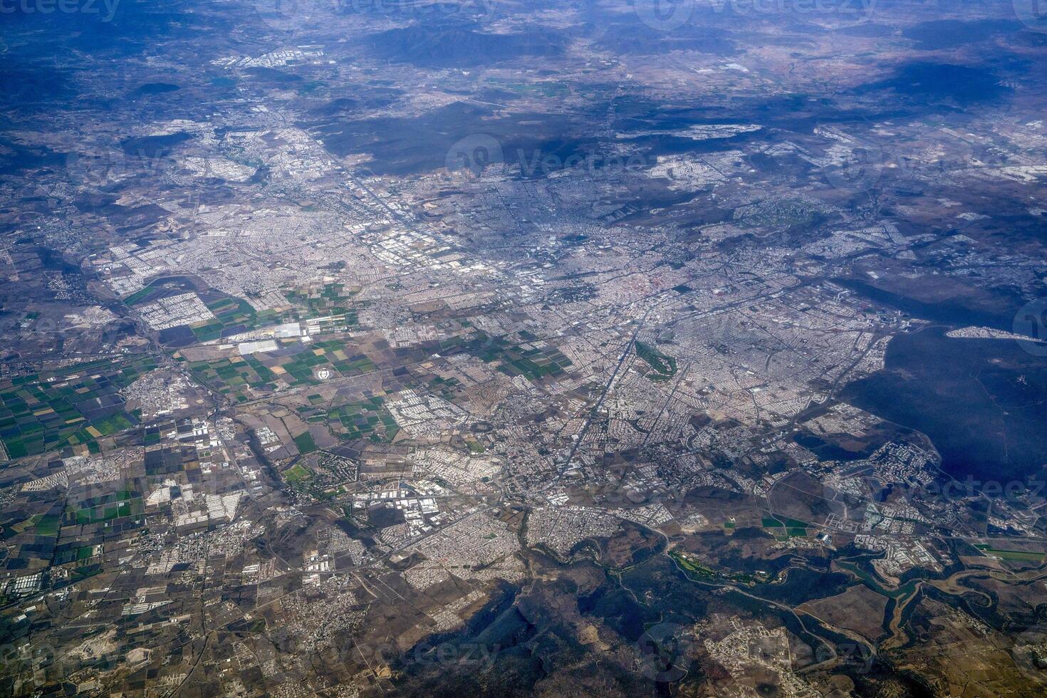 Aerial view of Santiago de Queretaro, a city in central Mexico. Panorama from airplane photo