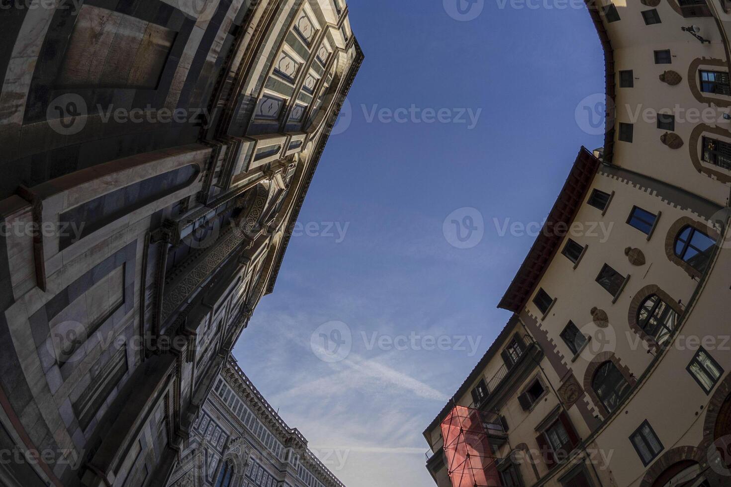 fisheye unusual view Cathedral Santa Maria dei Fiori, Brunelleschi Dome and Giotto Tower in Florence Italy photo