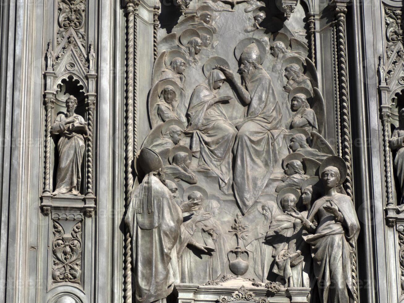 Florence Cathedral Santa Maria dei Fiori Italy - detail of sculpture of door photo