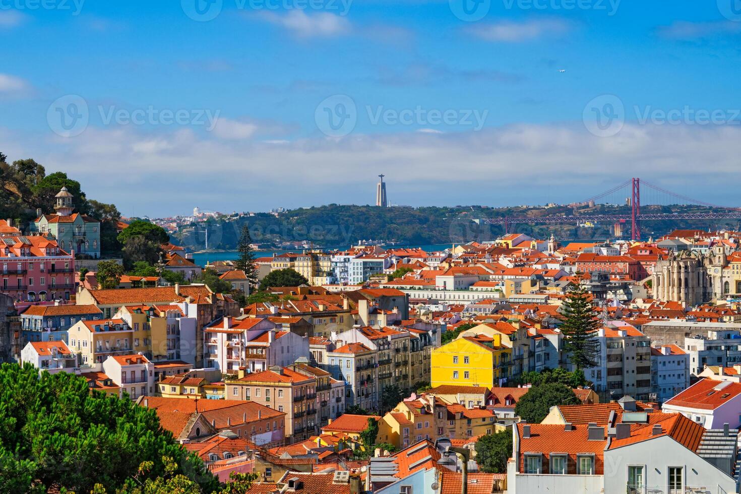 View of Lisbon from Miradouro dos Barros viewpoint with clouds. Lisbon, Portugal photo