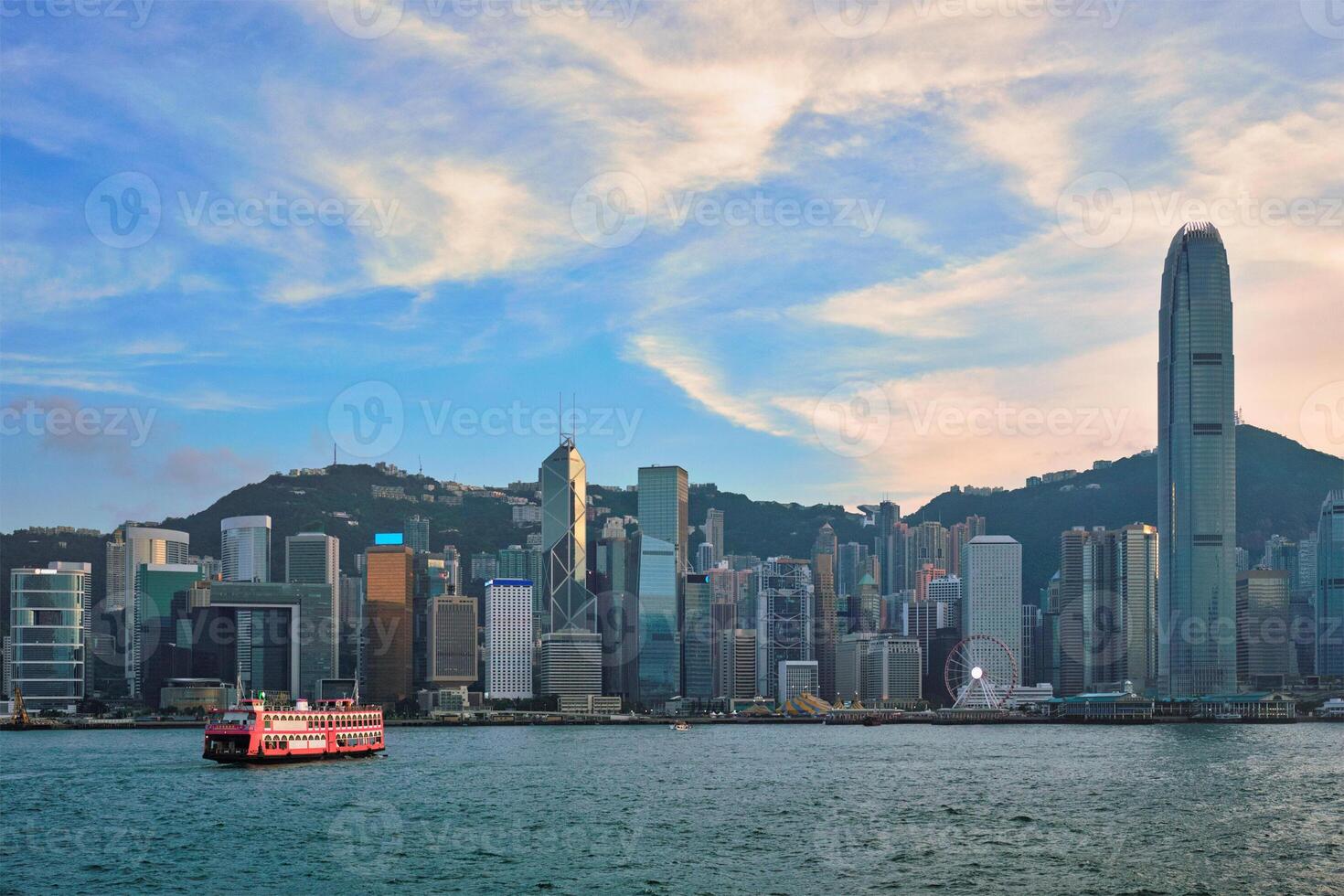 Junk boat in Hong Kong Victoria Harbour photo