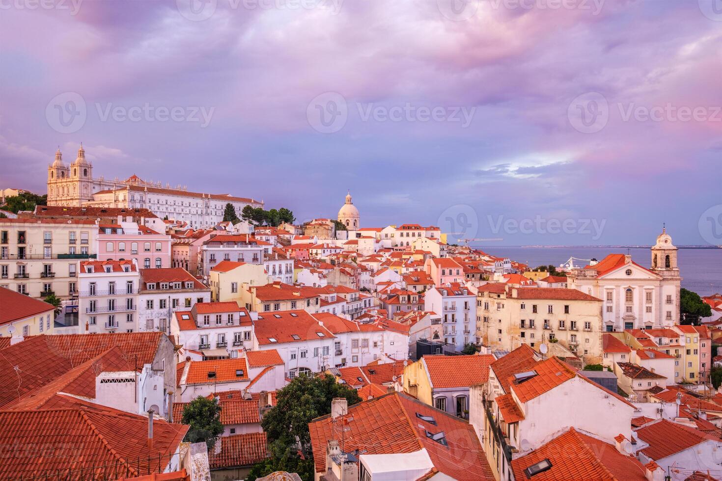 View of Lisbon from Miradouro de Santa Luzia viewpoint on sunsets. Lisbon, Portugal photo