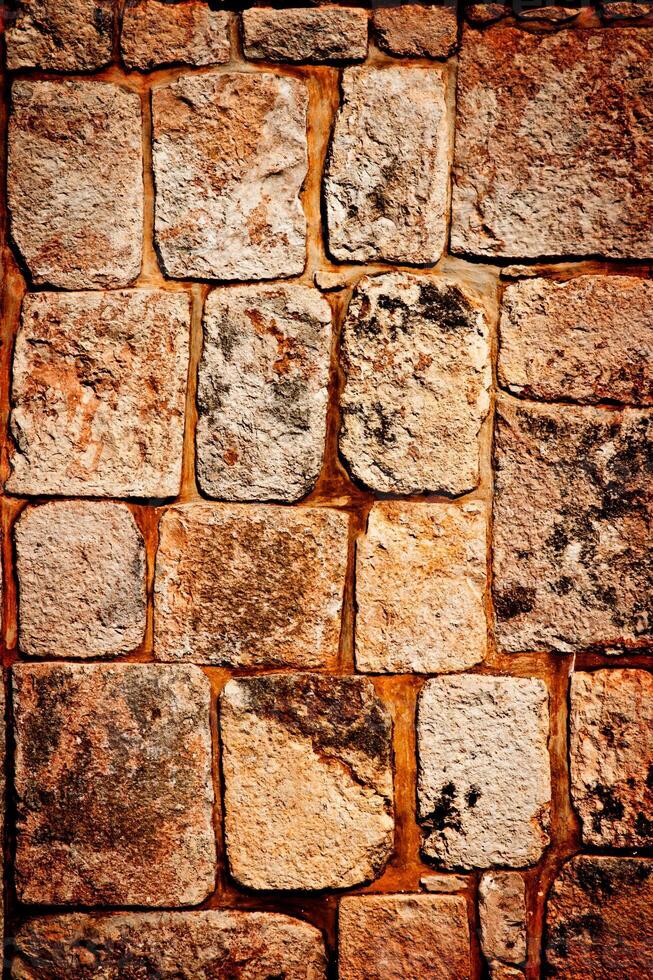 Ancient stone wall texture photo