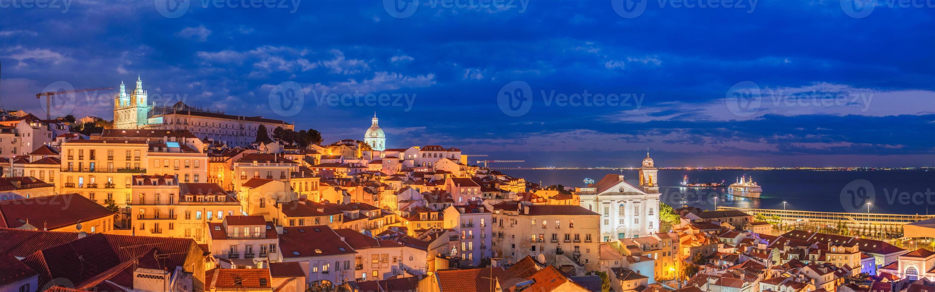 Panorama of Lisbon from Miradouro de Santa Luzia viewpoint at evening. Lisbon, Portugal photo