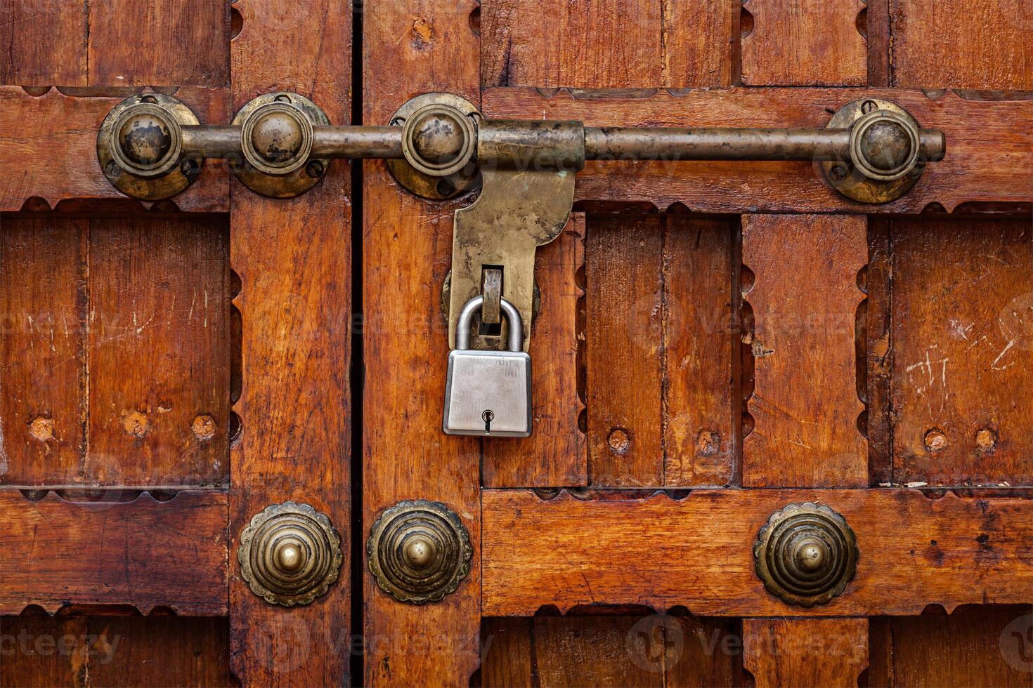 Latch with padlock on door photo