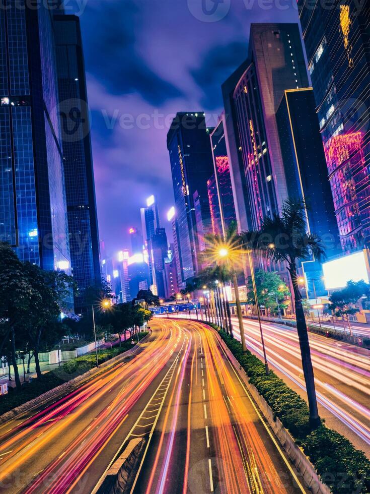 Street traffic in Hong Kong at night photo