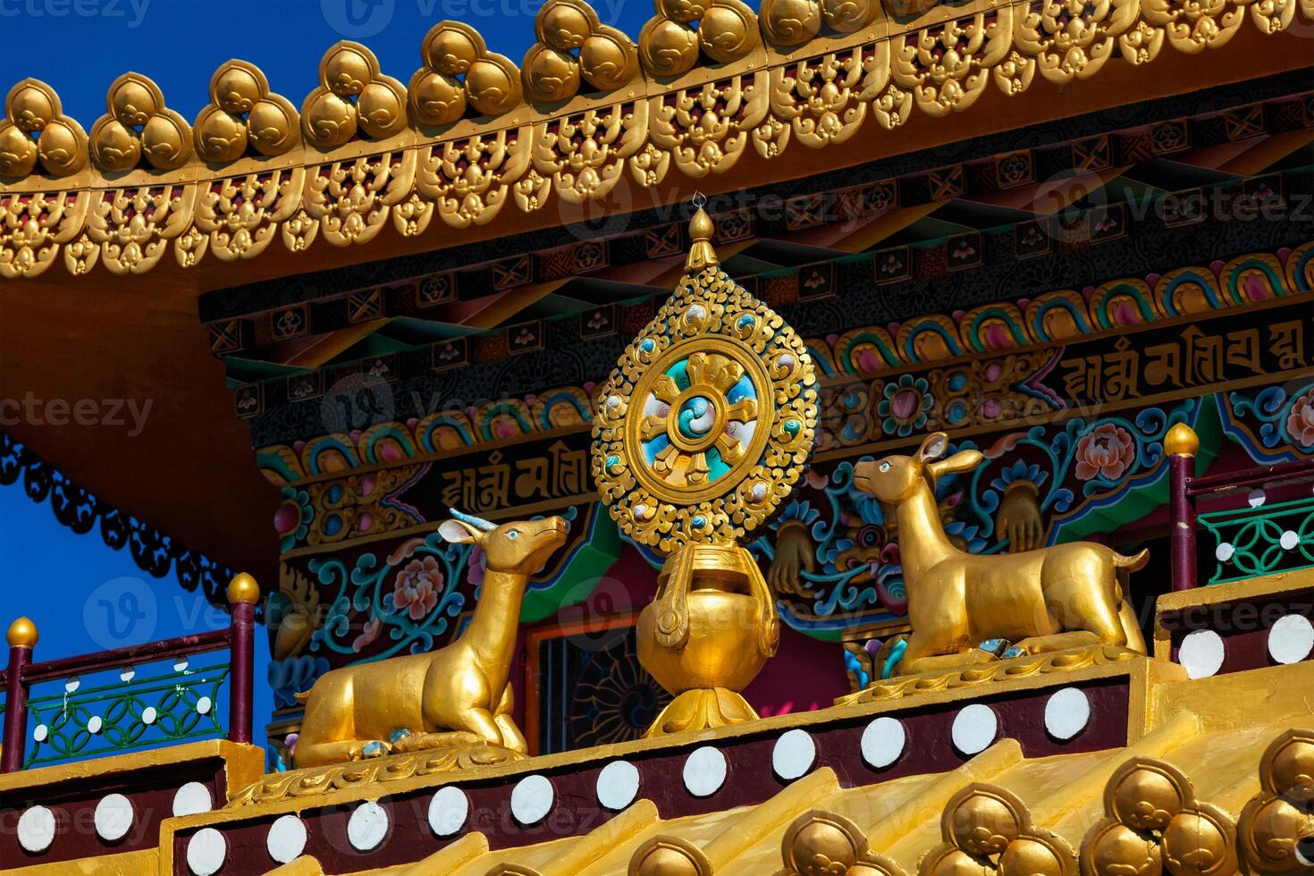 Buddhist Wheel of the Law on monastery, India photo