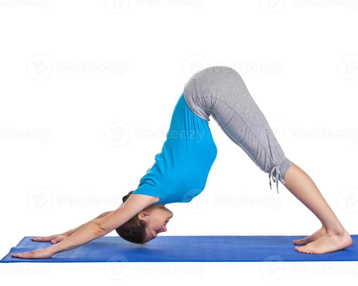 Yoga - young beautiful woman doing yoga asana exercise isolated photo