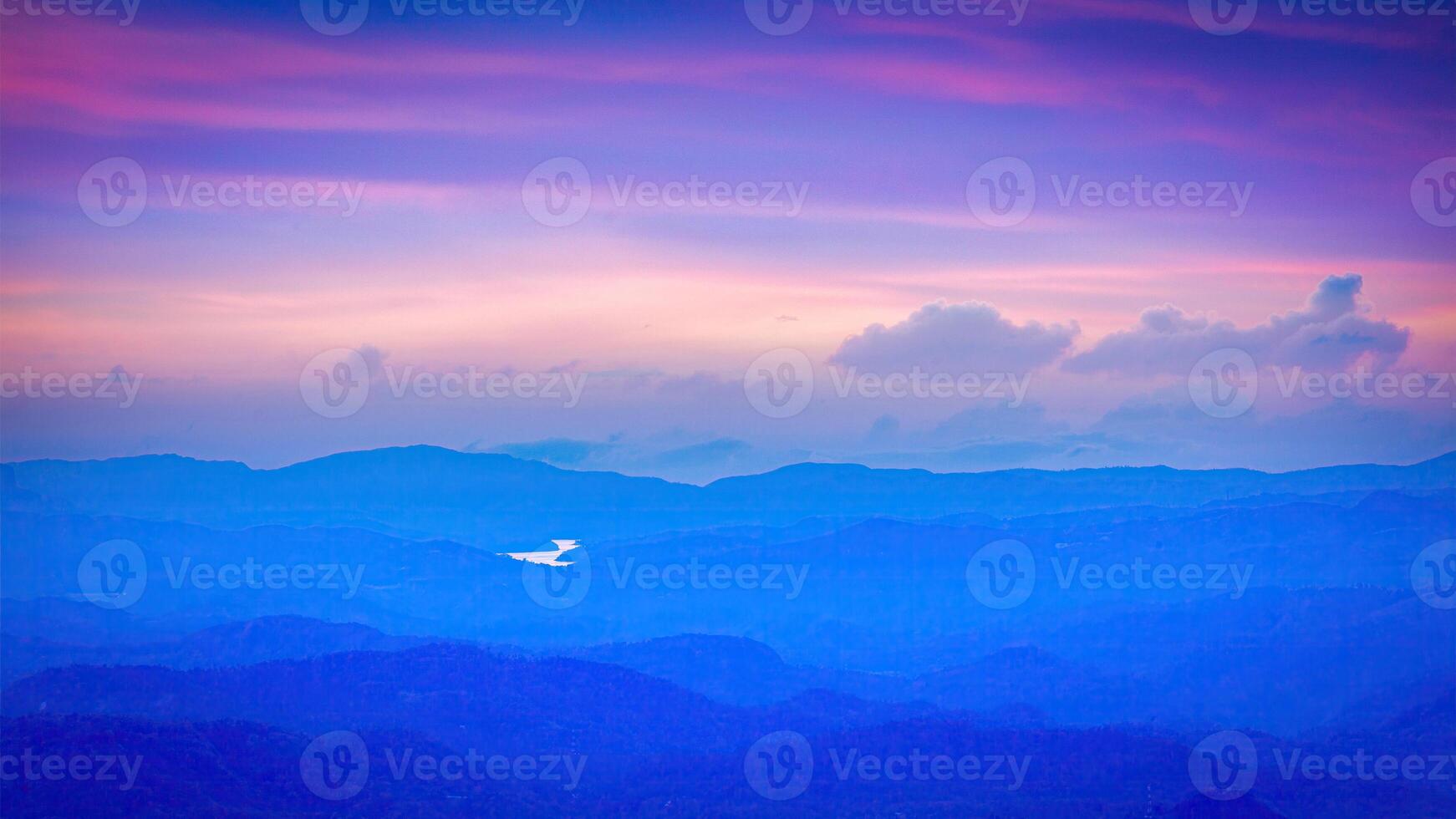 Sunset in mountains photo