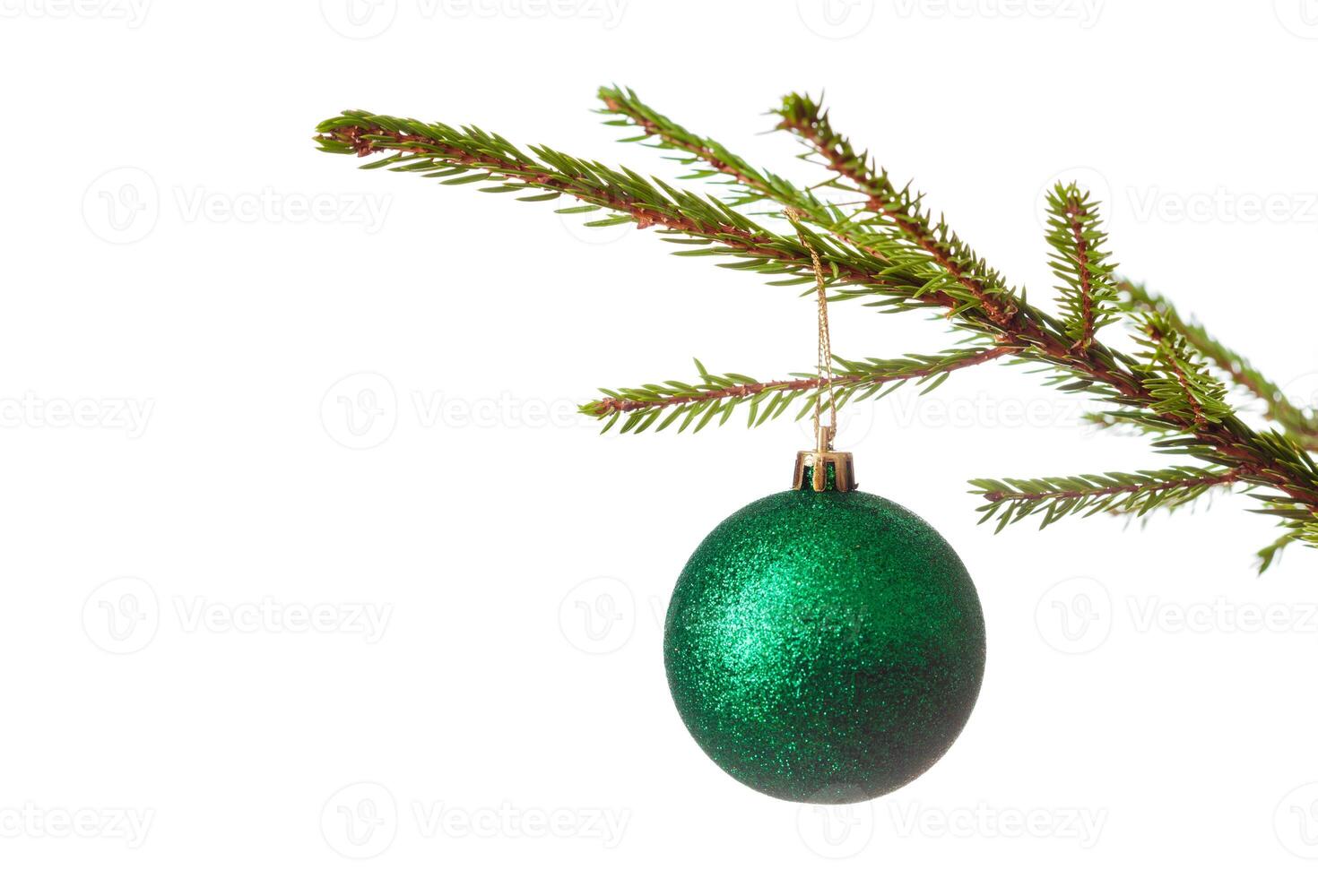 Decoration bauble on decorated Christmas tree iso photo