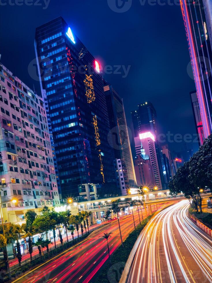 Street traffic in Hong Kong at night photo