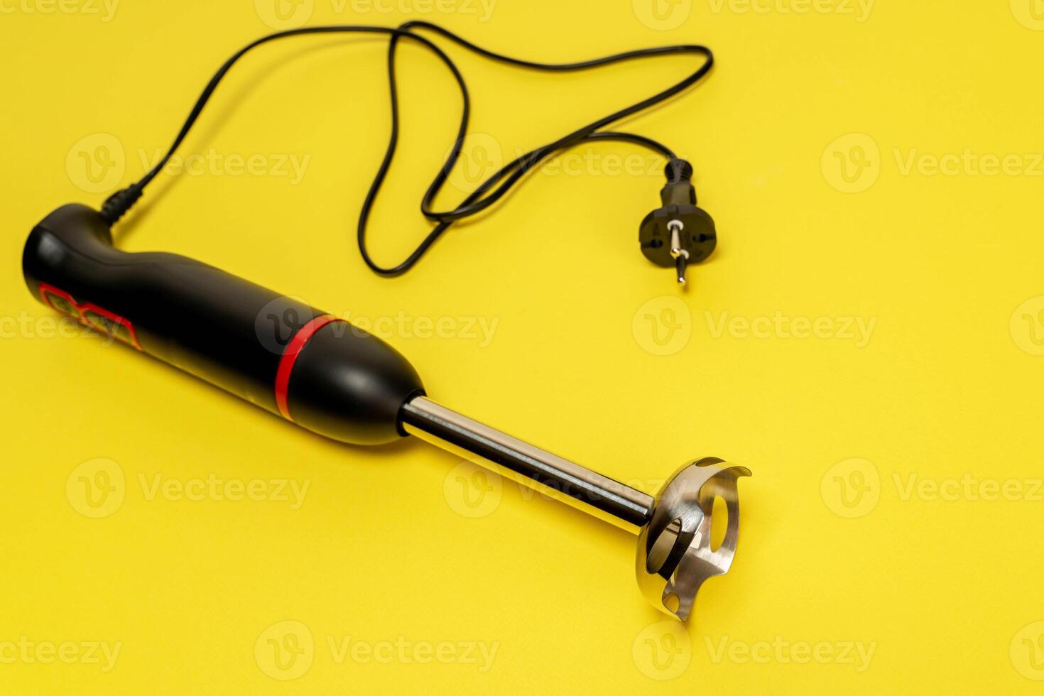 a kitchen blender on a yellow background, ready to mix and cook culinary masterpieces. photo