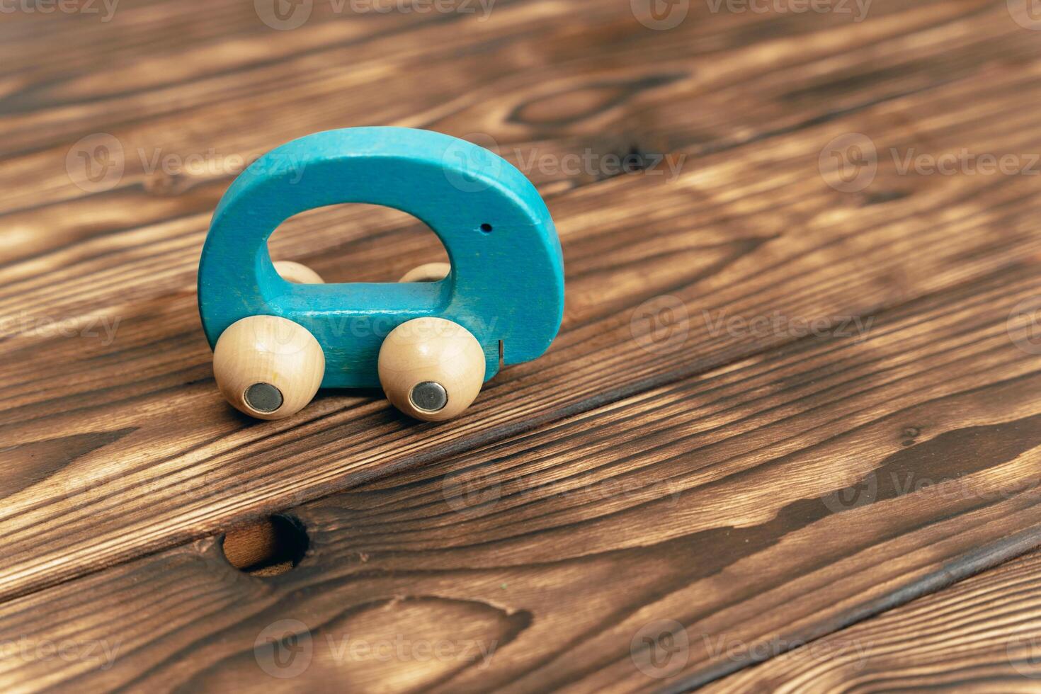 Wooden Toy Car on Table photo