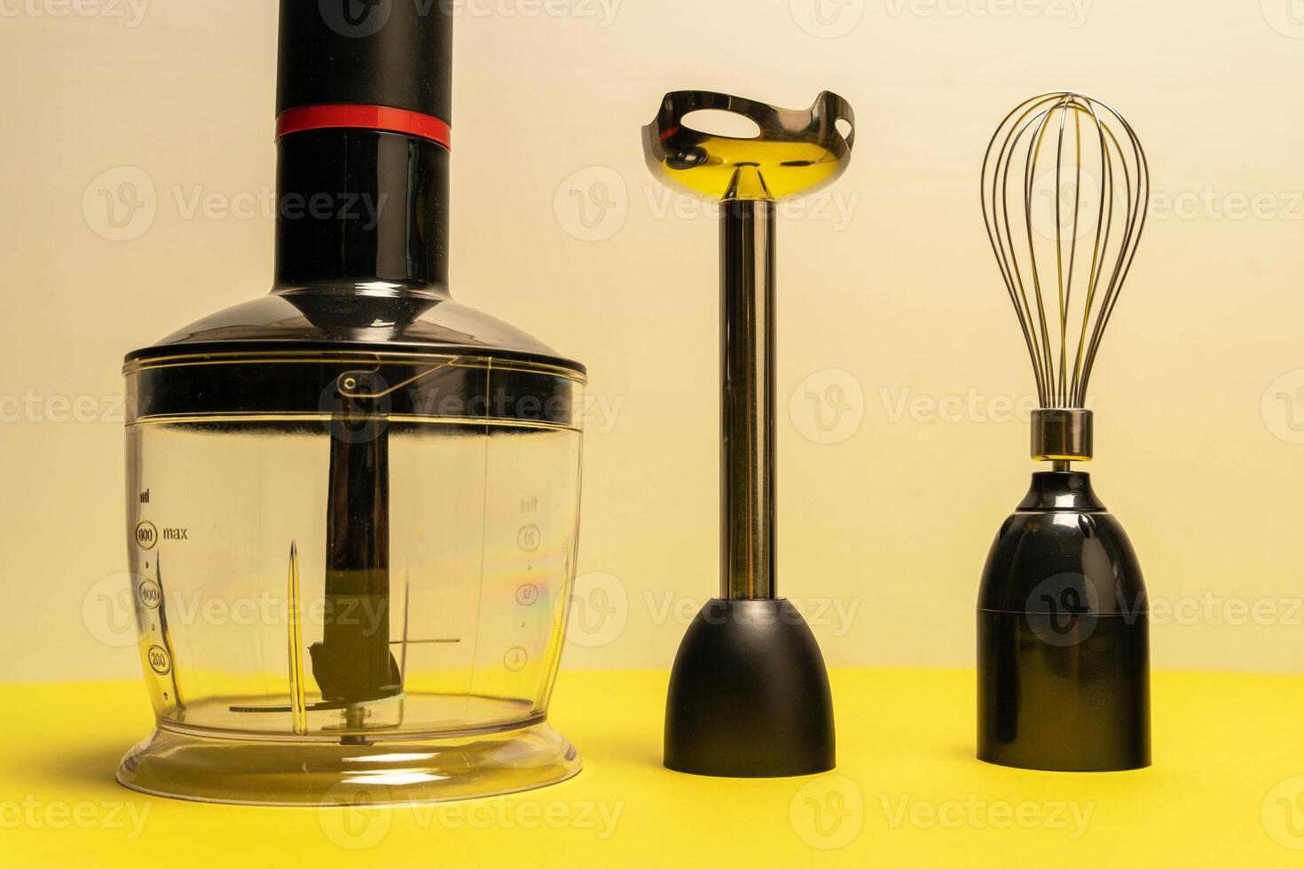 Blender, Whisk, and Attachments for Whipping on Counter photo