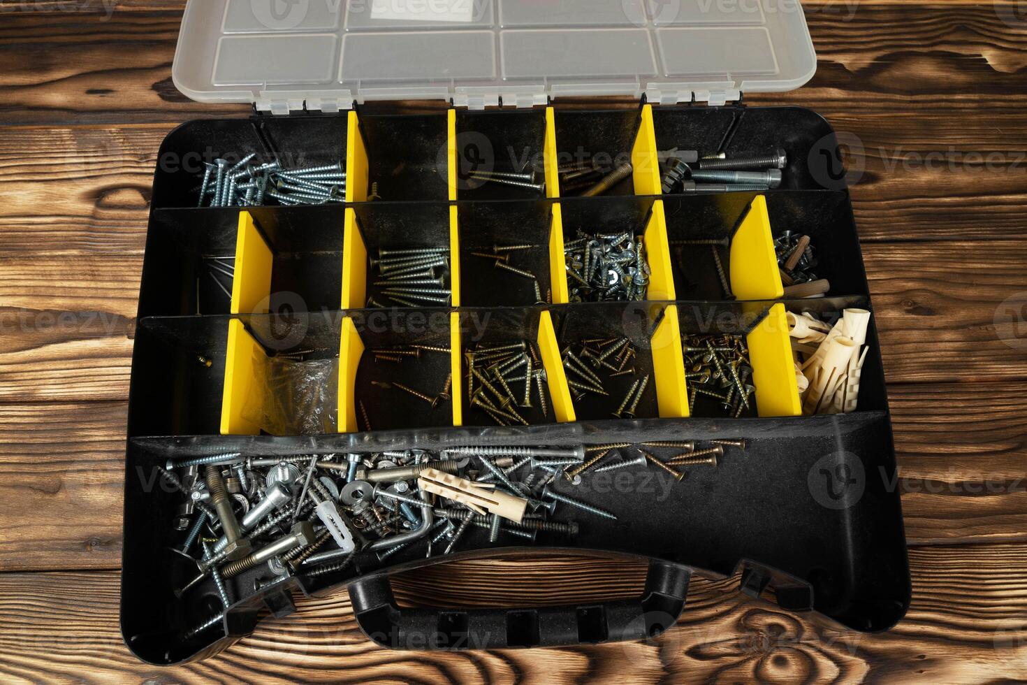 Toolbox Filled With Screws and Nails photo