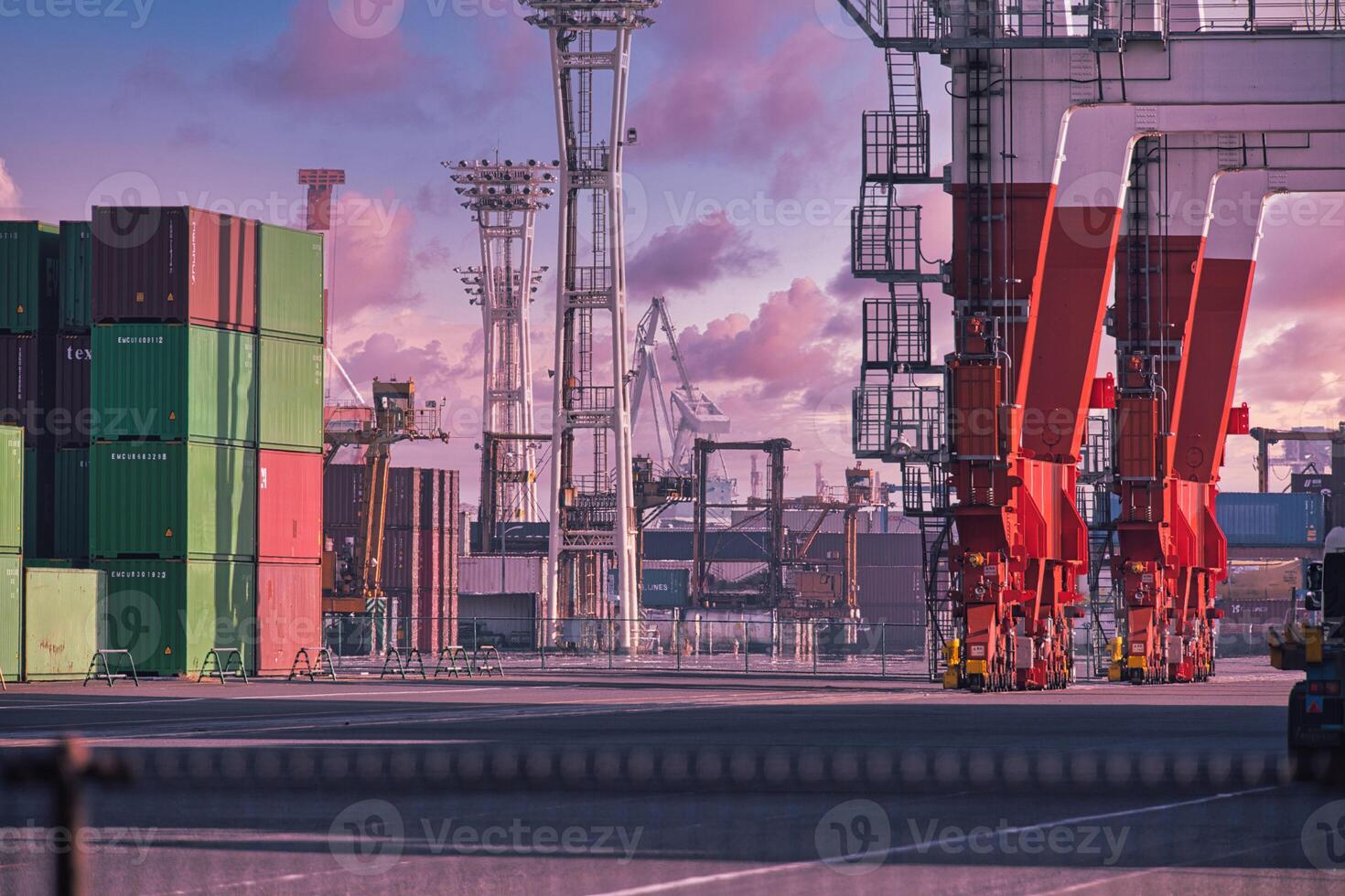 Containers and cranes near the port in Aomi Tokyo telephoto shot photo