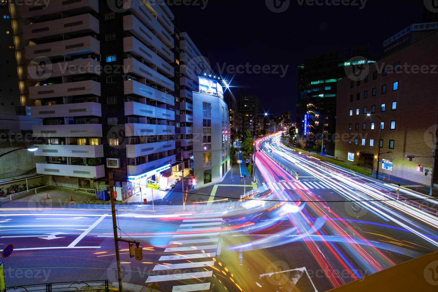 A night timelapse of traffic jam at Yamate avenue in Tokyo wide shot photo