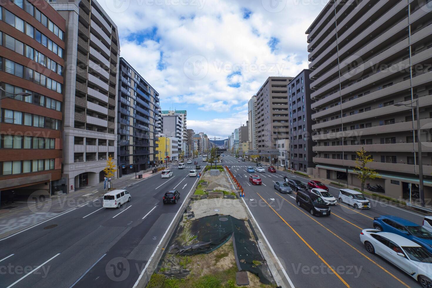 A traffic jam at the large avenue in Kyoto wide shot photo
