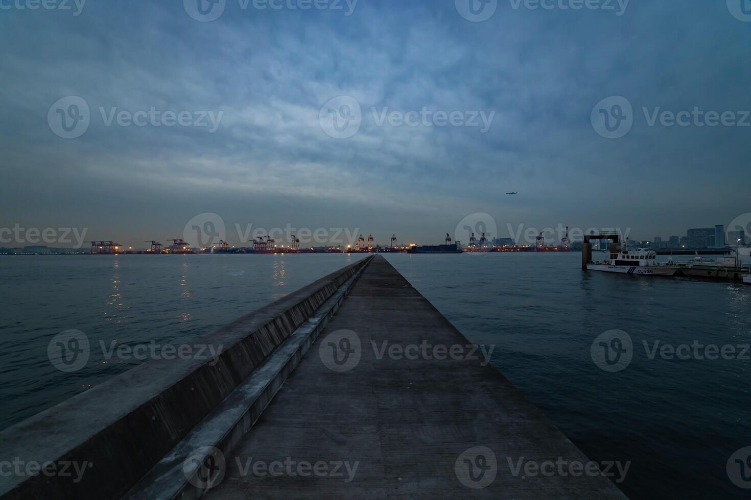 A dusk cityscape near the container port in Tokyo wide shot photo